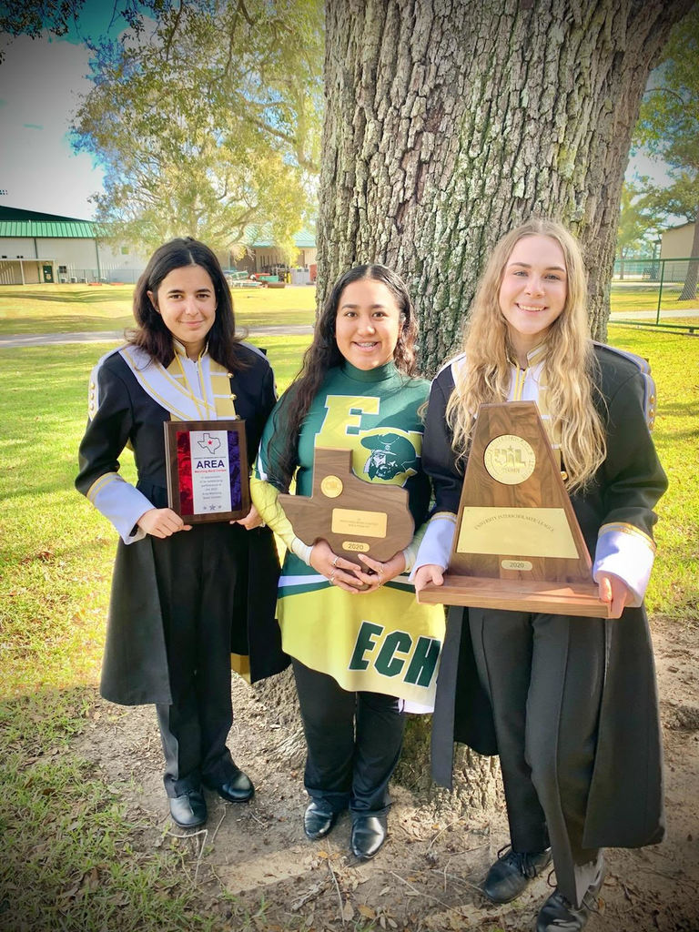 band students holding awards